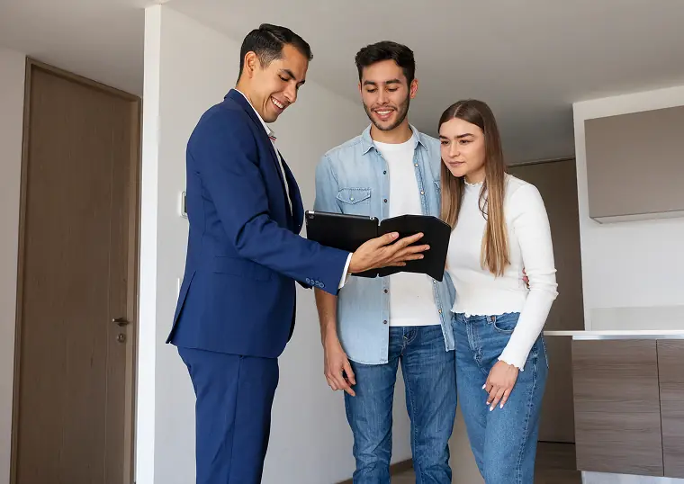 Who Are We? - Real estate professionals discussing with clients